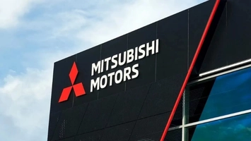 Mitsubishi Motors corporate sign on modern office building exterior